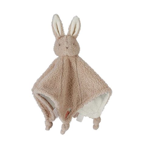 Close-up van een zacht, beige knuffeldoekje met een lieflijk gezichtje.