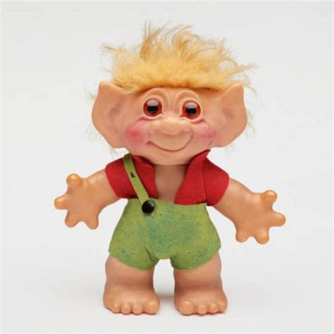 Illustratie van de originele Thomas Dam troll pop met felgekleurd haar