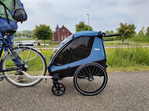 Diagram van verschillende fietskar koppelingstypes en hun bevestigingspunten op de fiets.