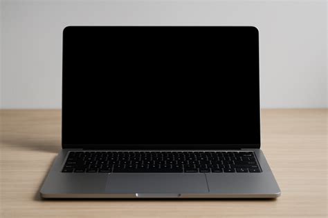 Illustratie van het scherm van de Game & Leer Laptop met verschillende leermenu's (letters, cijfers, muziek).