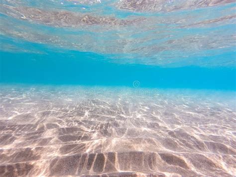 gezinsvriendelijk strand met zacht glooiende zeebodem en helder water
