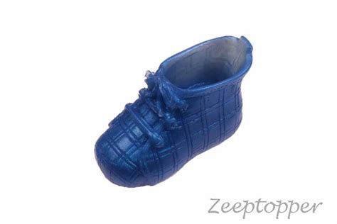 Voorbeelden van zeepjes in babyschoen- en tutjesvorm