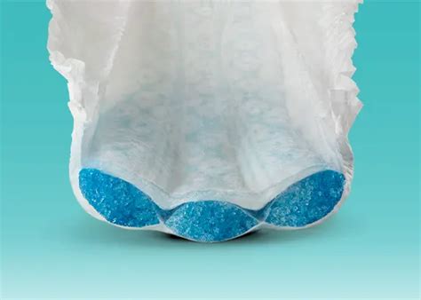 Detailopname van de absorberende kern en anti-lekrandjes van een luier