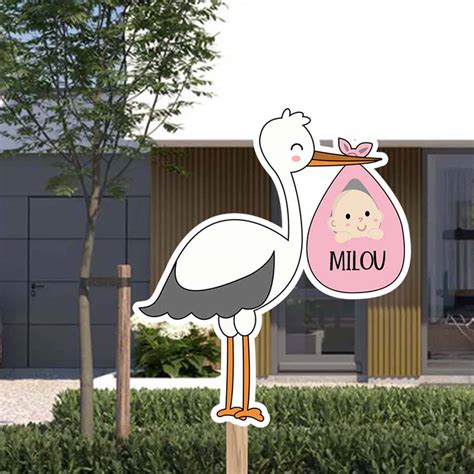 Voorbeeld van een tuinbord met ooievaar in roze tinten