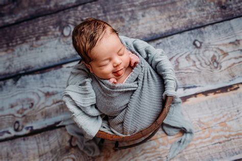 Baby in slaap tijdens een newborn fotoshoot