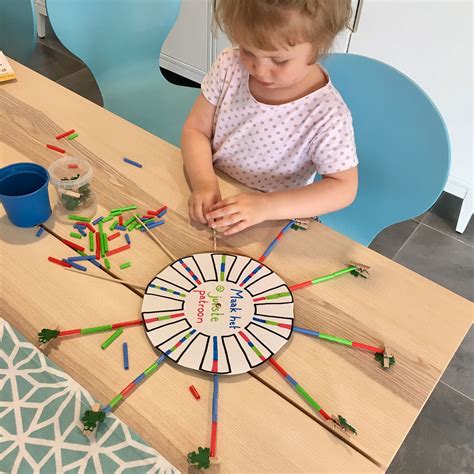 Detail van het sterrenspel met wisselbare opdrachten.