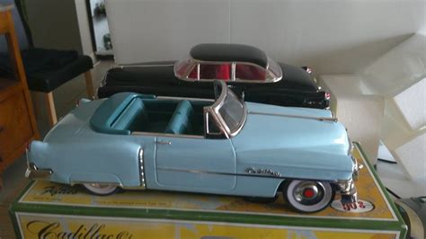 Collage van verschillende blikken Cadillac modellen uit Japan, waaronder de Ichico Eldorado.