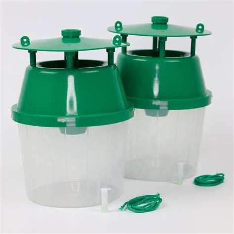 Een feromoonval voor buxusmotten, met een gedetailleerde weergave van de val en het feromoon.