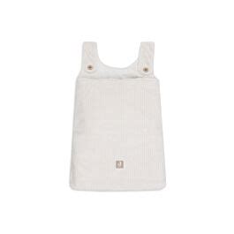 Boxopbergzak van Jollein in oatmeal kleur, bevestigd aan de zijkant van een babybox met speelgoed erin.